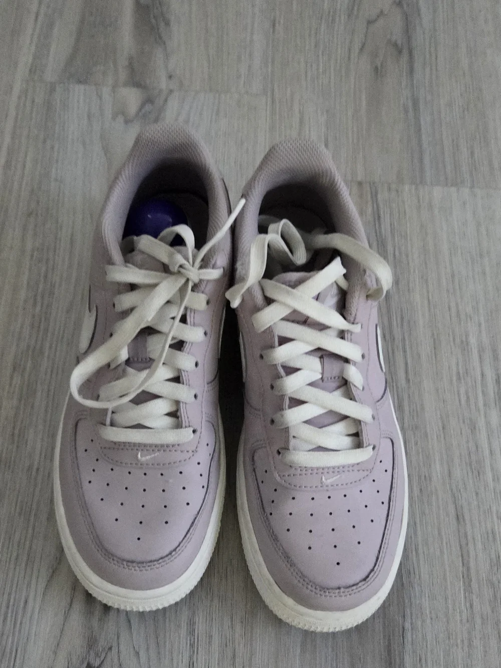 Nike Women’s Low-Top Sneakers in Pale Lavender with White Swoosh